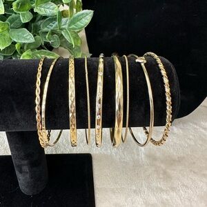 Gold Toned Bangles. Set of 9.